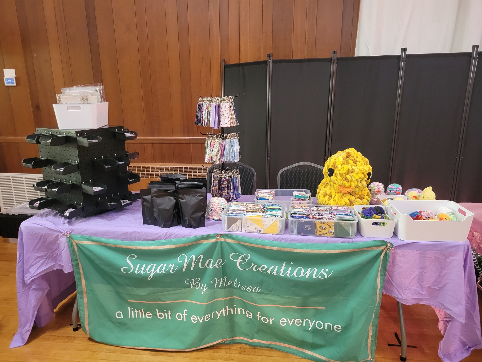 Giant Yellow Crochet Duck on display table.jpg