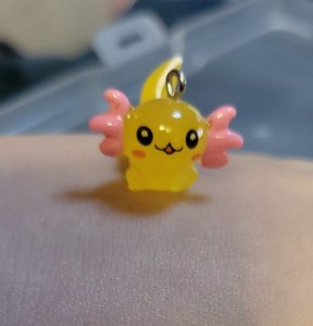 Yellow axolotl with orange fins stitch marker for crochet or knitting.jpg